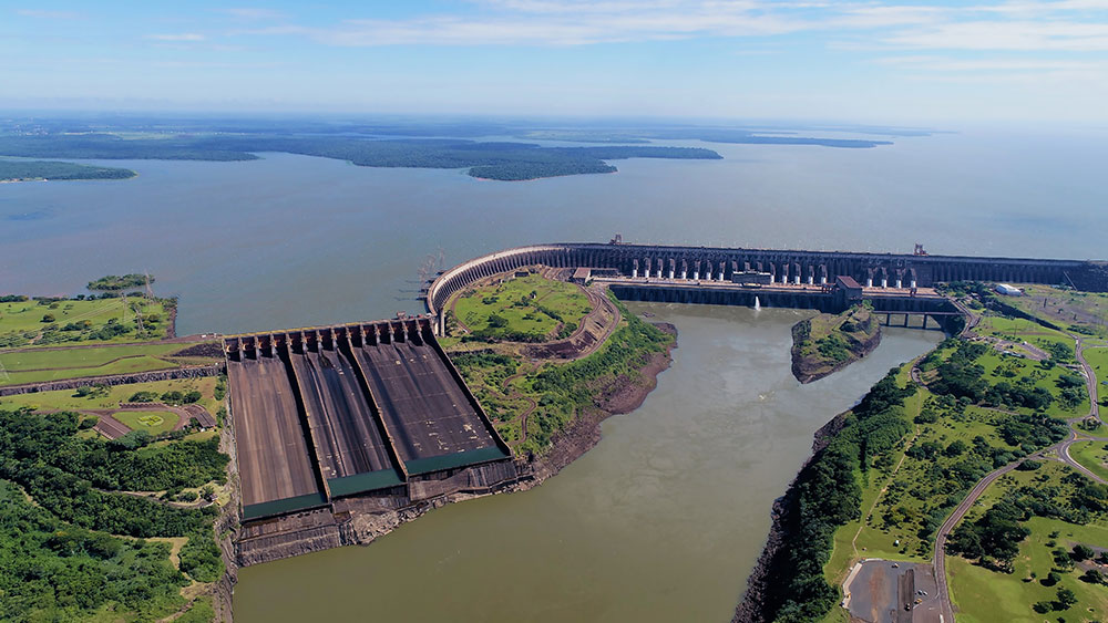 An aerial photo of a large hydroelectric dam and reservoir in Brazil