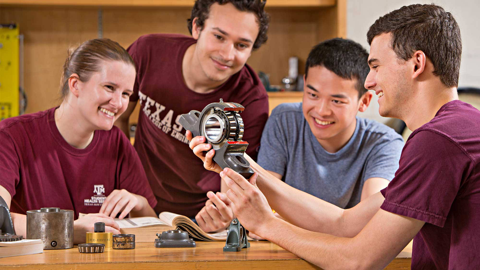 student group learning about engineering in a hands-on classroom setting