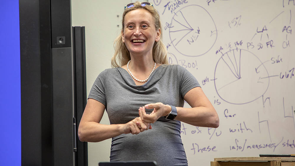 Image of Dr. Hammond speaking to her class.