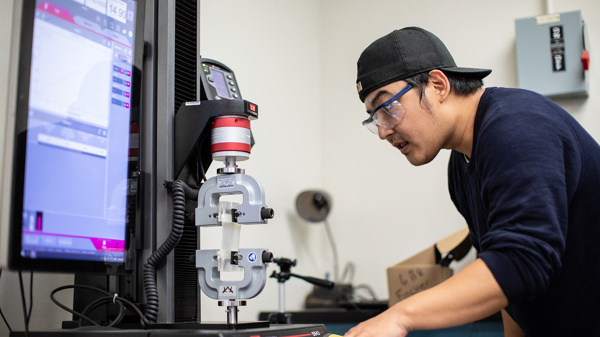 Mechanical Engineering student demonstrating research